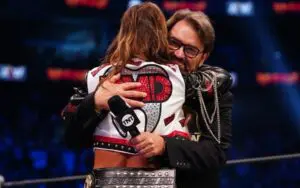 Adam Cole Responds To Photo Of Britt Baker Hugging Tony Schiavone