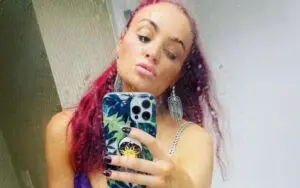 Maria Kanellis Stuns In Wet Purple Dress Selfie