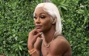 Jade Cargill Bends Over Table For Seductive Pose In Tight Dress Photo Drop