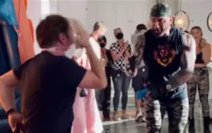 Batista Gives WWE Title To 'Knives Out' Director