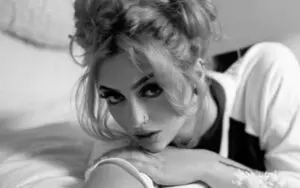 Gigi Dolin Gives A Seductive Gaze In Cheeky Black One-Piece Photo Drop