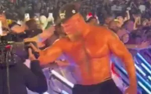 Brock Lesnar Steals Fan's Cap After WWE SummerSlam