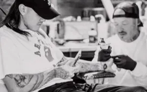 Dominik Mysterio Adds to Tattoo Collection With Striking New Ink