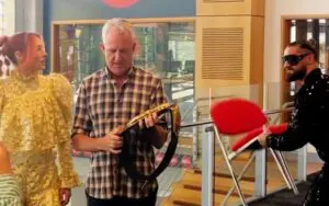 Becky Lynch Stops Seth Rollins from Attacking Man from Behind with a Chair