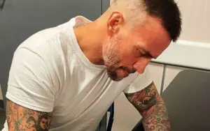 CM Punk Shares Behind-the-Scenes Photos of WWE Contract Signing with Triple H