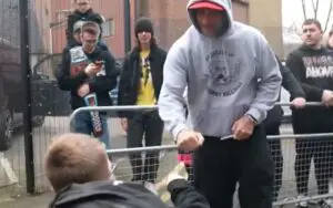 WWE Captures Touching Video of CM Punk Meeting Young Fan in Wheelchair