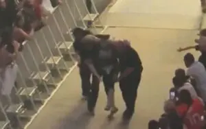 Rey Mysterio Helped to the Back After SmackDown Match