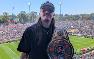 Dominik Mysterio Pulls Up to PSG vs. Atlético Madrid Match with Custom WWE Title in Hand