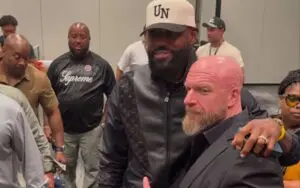 Triple H Strikes Iconic Pose with LeBron James at Fanatics Fest