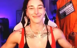 Rhea Ripley Expands Her Ink Collection With Bold New Chest Tattoo