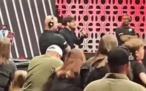 Tony Khan Awkwardly Sings “Country Roads” Before AEW Collision