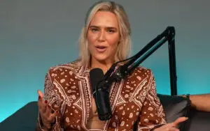 CJ Perry Says WWE Had a Problem With Her Ring Gear Showing Too Much