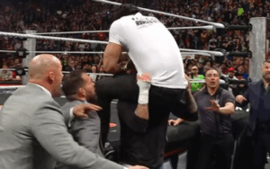 CM Punk Powerbombs Roman Reigns Through Announce Table During 3/30 WWE RAW CM Punk Powerbombs Roman Reigns Through Announce Table During 3/30 WWE RAW