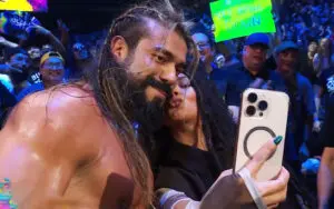 Identity of Fan Kissing Andrade During AEW Revolution Revealed