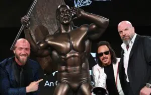 Triple H and Nick Hogan Unveil Hulk Hogan Statue at WWE World During WrestleMania Weekend