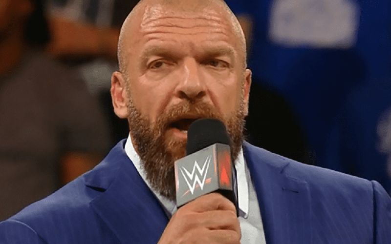 Triple H Cuts Promo On Fan During Press Conference