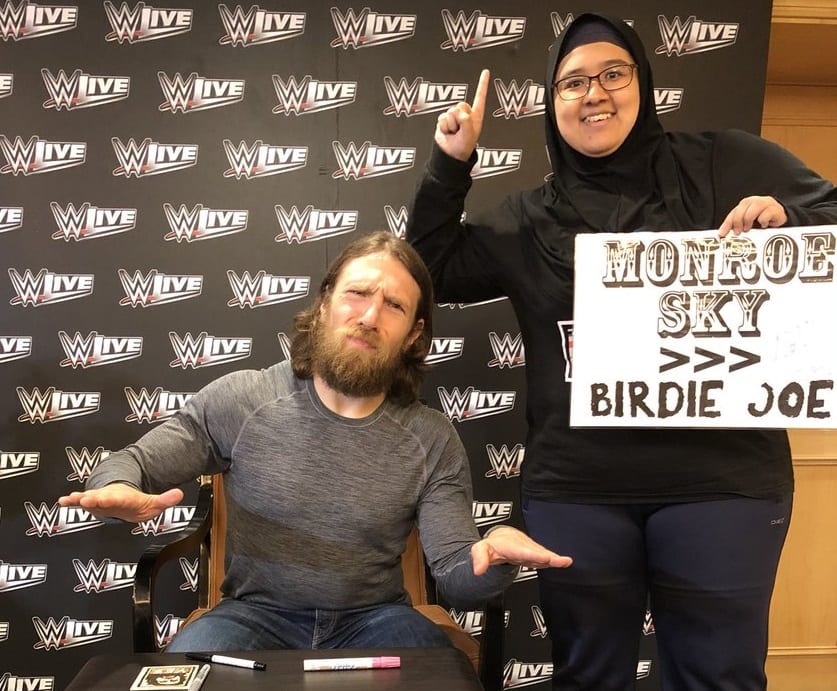 Daniel Bryan Reacts To Sign Saying The Miz’s Daughter Is Better Than His