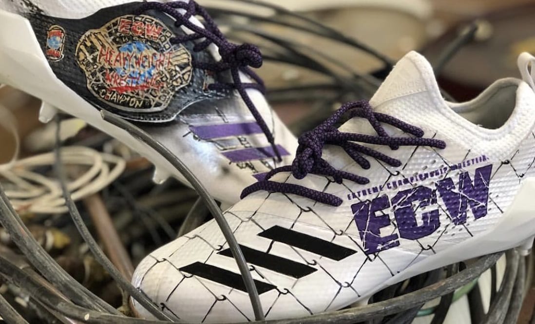 NFL Player Sports ECW-Themed Cleats During Game