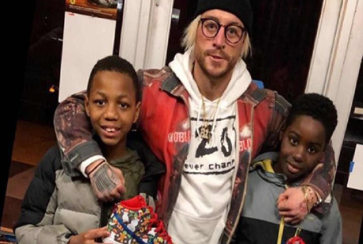 Enzo Amore Gives Up The Shoes Off His Feet In Charity Donation
