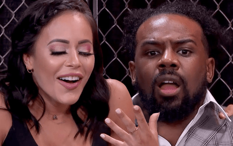 Watch Xavier Woods & Charly Caruso Take Ghost Pepper Chip Challenge During WWE Hell In A Cell