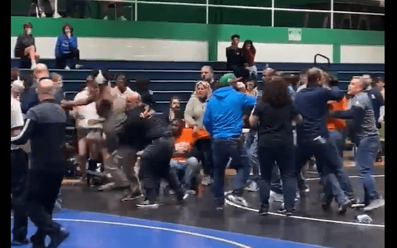 WATCH: Father Arrested For Starting Wild Brawl At Son’s High School Wrestling Match