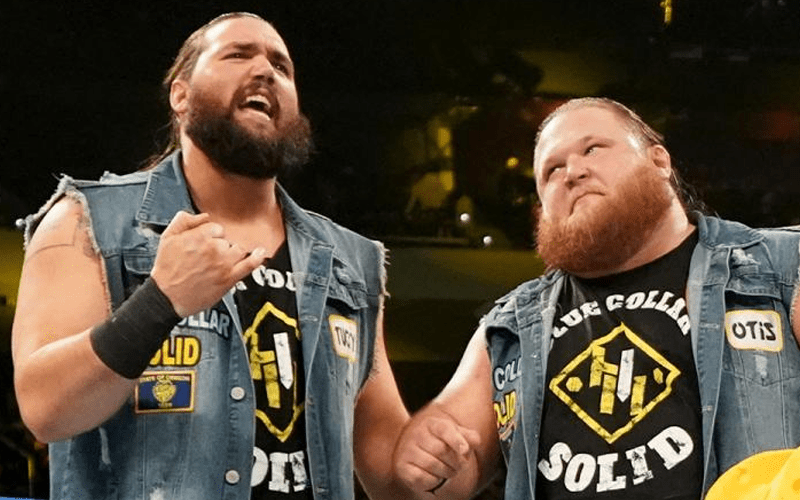 Why WWE Kept Titles Off Heavy Machinery At Elimination Chamber