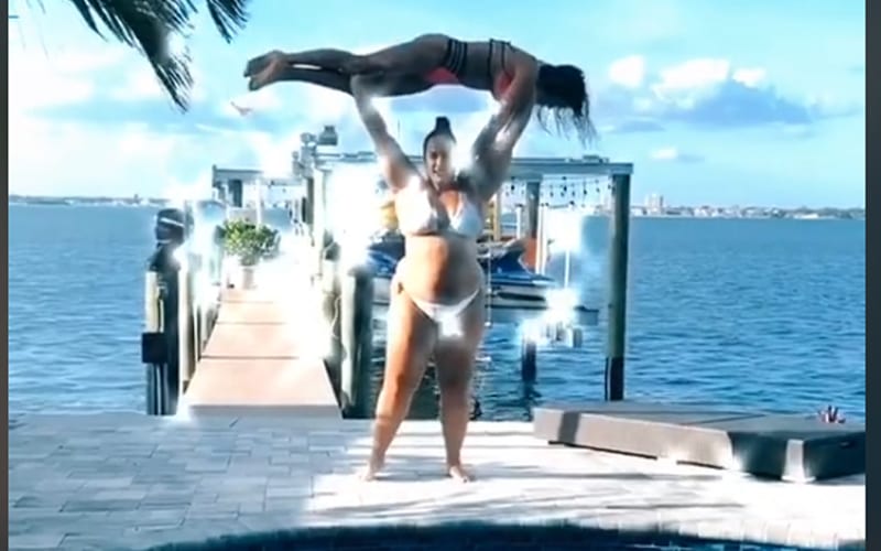 WATCH Nia Jax Slam Friend Into Pool In New Bikini TikTok Video