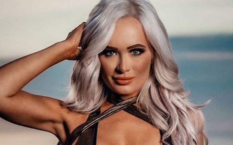 Scarlett Shows Off Skimpy Outfit In Sizzling Beachside Photo