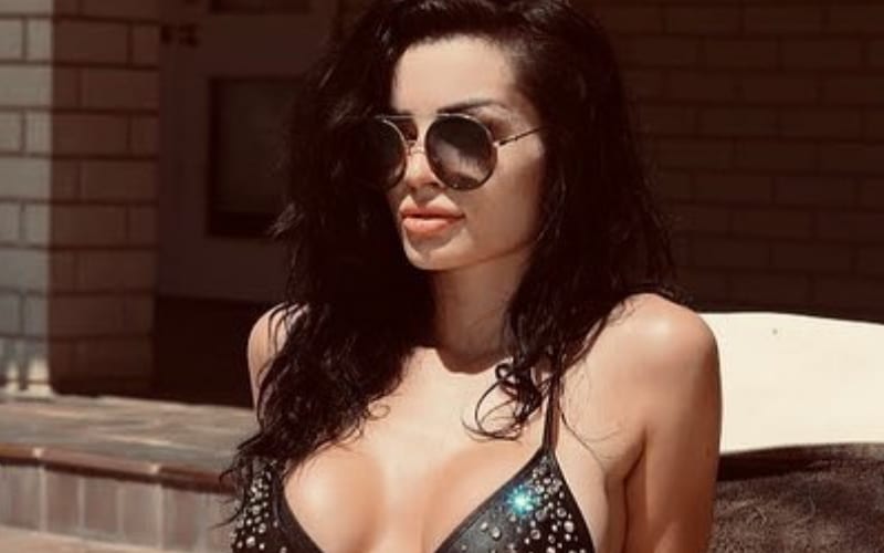 Paige Drops Stunning Bikini Photos To Let Fans Know She’s Playing With Zelina Vega