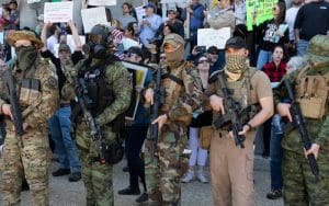 Pro Wrestling Tees Called Out For Selling Far-Right Militia Merchandise