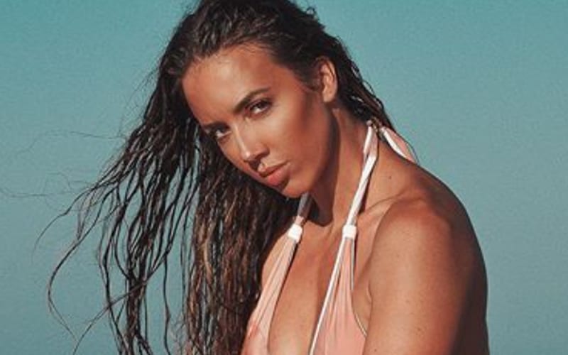 Chelsea Green Stuns While Strolling On The Beach In New Photos