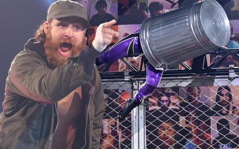 Sami Zayn Compares Io Shirai’s INSANE Garbage Can WarGames Stunt To Famous Deathmatch Wrestler