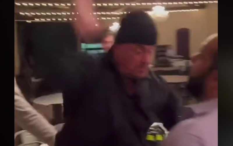 Undertaker Lays Out Fan With Brutal Chop