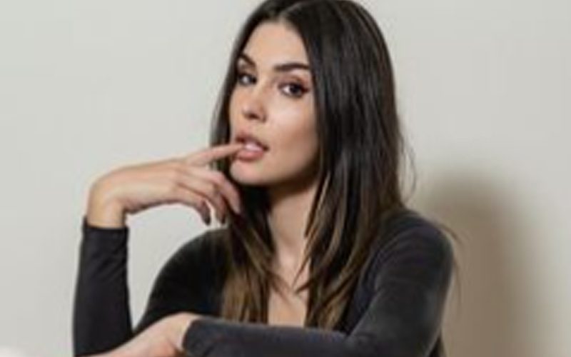 Cathy Kelley Waiting For Someone To Knock Her Socks Off With Back Bodysuit Photo Drop
