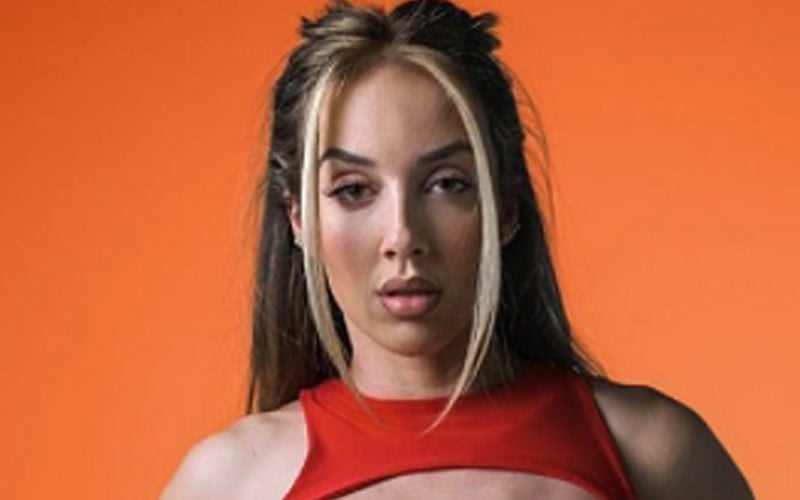 Chelsea Green Stirs Up Drama In Revealing Red One-Piece Photo Drop