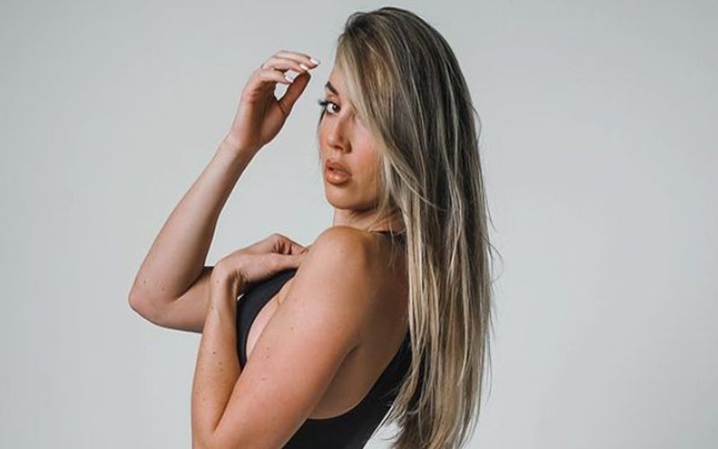 Chelsea Green Sizzles In Black One-Piece Photo Drop
