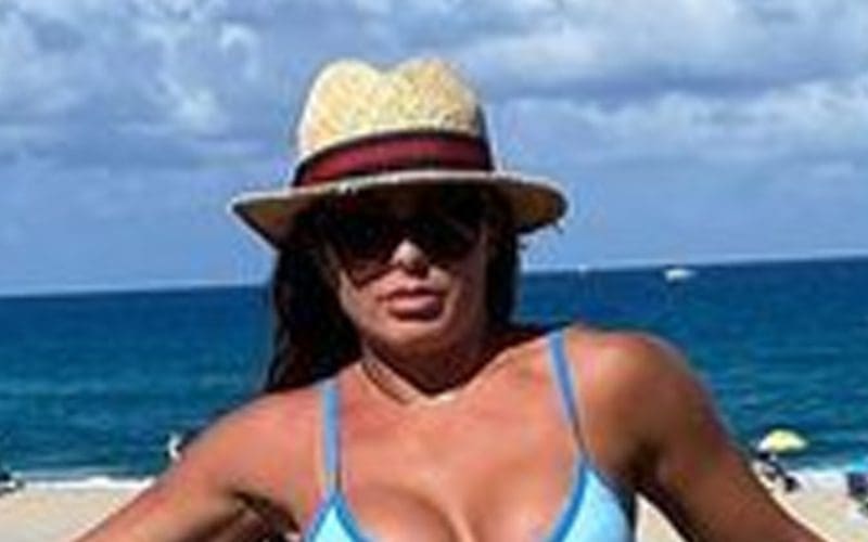 Mandy Rose Drops Sultry Beach Photo In Skimpy Blue Bikini