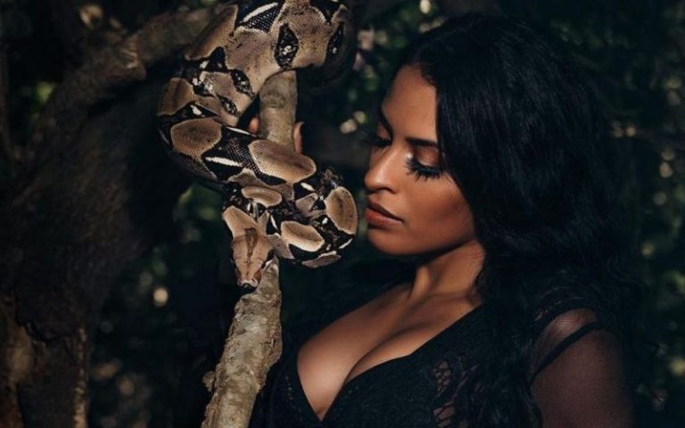 Zelina Vega Asks Fans What She’s Whispering To A Snake In Sizzling Sheer Black Lingerie Photo Drop