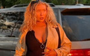 Nikkita Lyons Blesses Fans With Sun-Kissed Black Dress Photo Drop