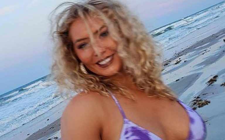 Nikkita Lyons Flaunts Barely There Blue Bikini In Exquisite Beach Photo Drop