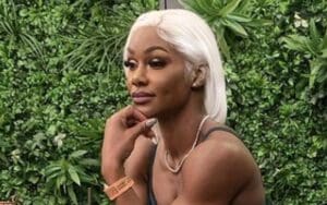 Jade Cargill Bends Over Table For Seductive Pose In Tight Dress Photo Drop