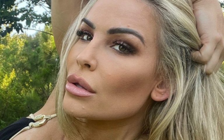 Natalya Lays Out In The Grass While Rocking Barely There Bikini