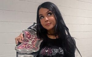 Cora Jade Cosplays As AJ Lee For Halloween