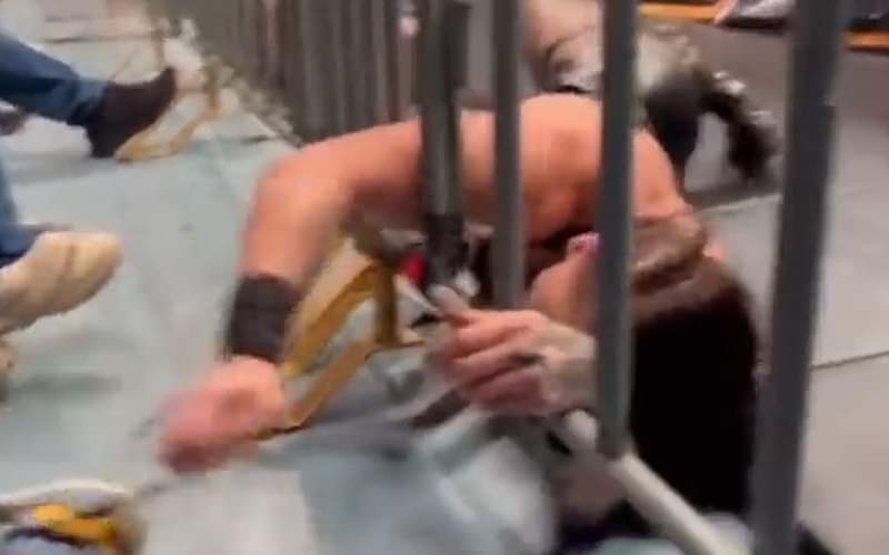 Rhea Ripley Trolls Fan By Untying Their Shoe During WWE Live Event