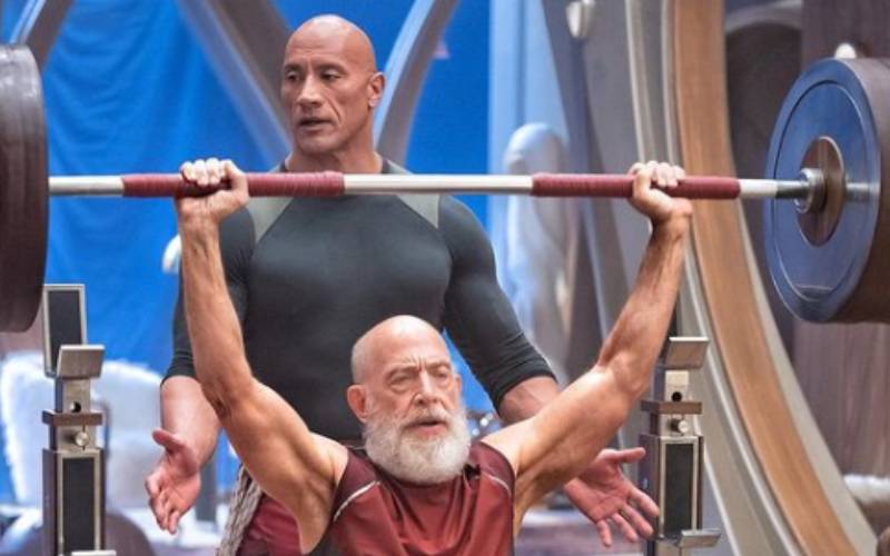 Dwayne Johnson Helps JK Simmons Bulk Up At North Pole For 'Red
