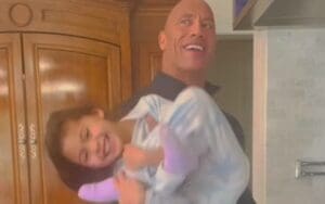 The Rock Flexes Doing ‘Daddy Curls’ With His Daughter The Rock Flexes Doing 'Daddy Curls' With His Daughter
