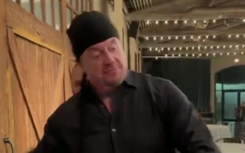 Undertaker Takes Down A Fan With A Friendly Chop