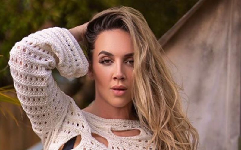Chelsea Green Turns Heads In Skimpy Black One-Piece Photo Drop