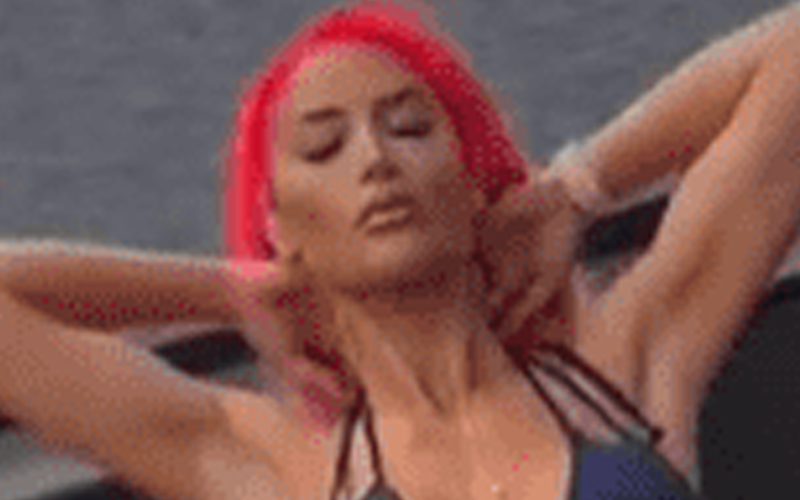 Eva Marie Shows Off Her Abs In Mind-Blowing Blue Bikini Video Drop