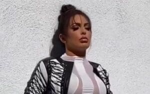 Mandy Rose Stuns In Super Skimpy White One-Piece Video Drop